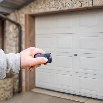 San Antonio security key fob pointing to a garage door